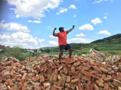 We helped the congregation in gathering brick so they could have their own brick oven. Figured I might as well make an epic photo with that kind of background. I believe the pose fits the tone of the photo.